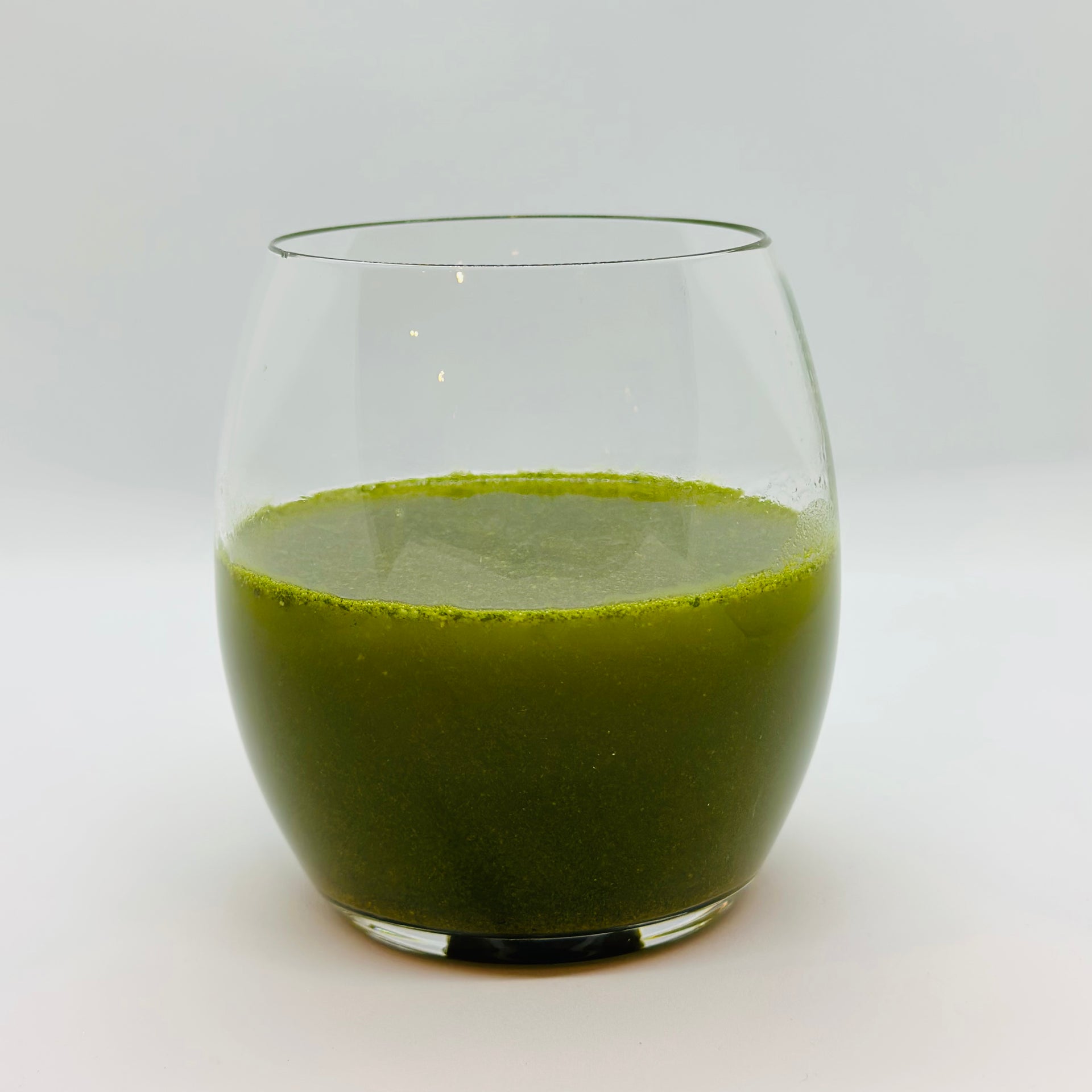 PlantEm NourishEm Greens Powder in water